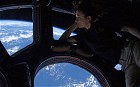 Twitpics from space: astronaut Astro_Wheels sends pictures to Earth via Twitter. Astronaut Tracy Caldwell Dyson gazes at the view of Earth from of the windows of the Cupola on the International Space Station, before she headed home with teammates Sasha and Misha on a Soyuz space craft